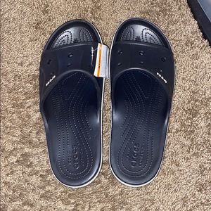 Brand New, never worn Croc slides